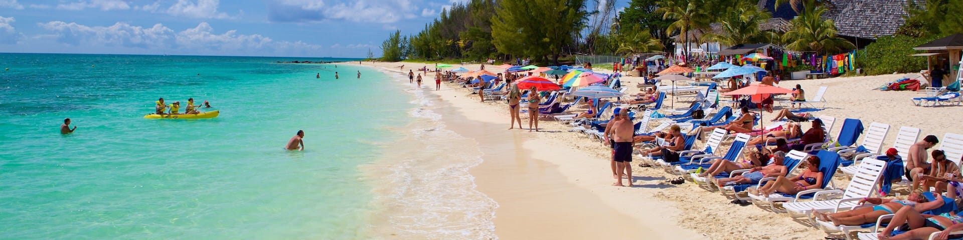 Taino Beach which includes a beach, general coastal views and a luxury hotel or resort