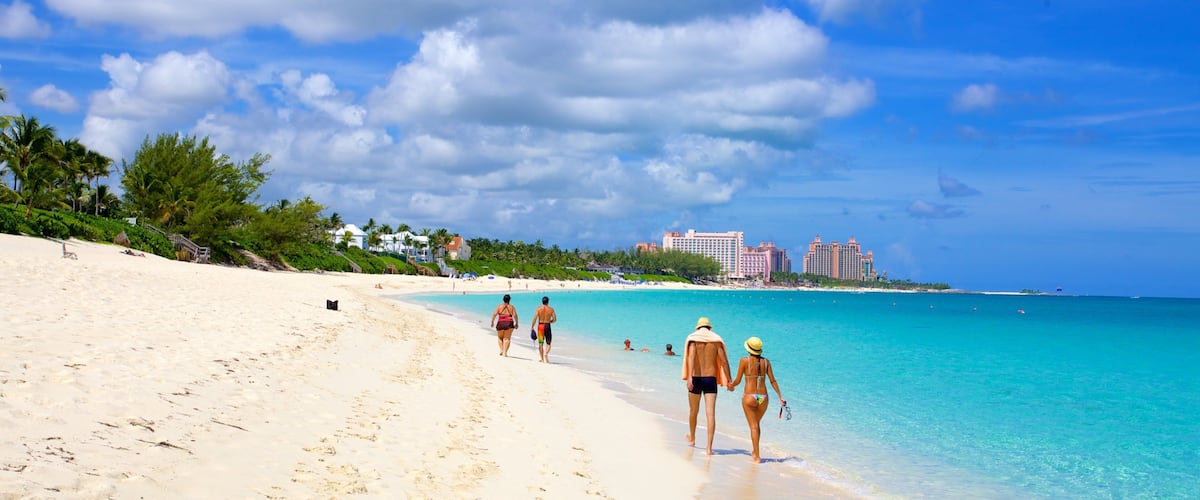 Cabbage Beach showing a beach, landscape views and a coastal town