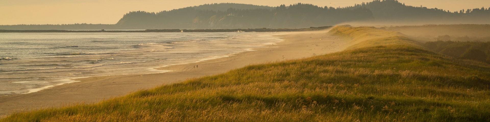 Fort Stevens State Park showing general coastal views, a beach and a sunset