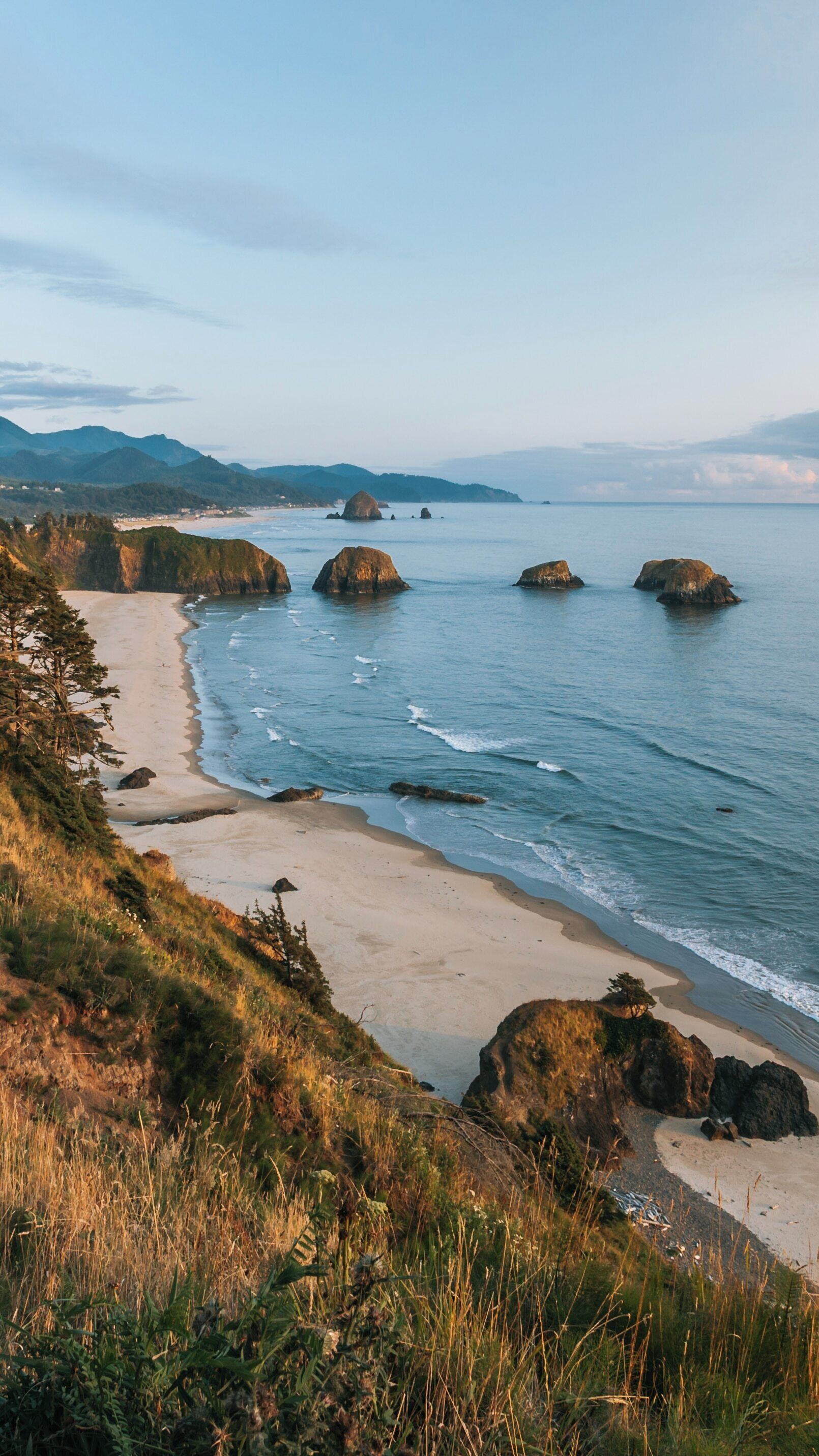 Beautiful landscape view of Ecola State Park at Cannon Beach in Oregon during golden hour