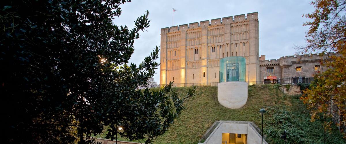 Norwich Castle showing heritage architecture and a garden