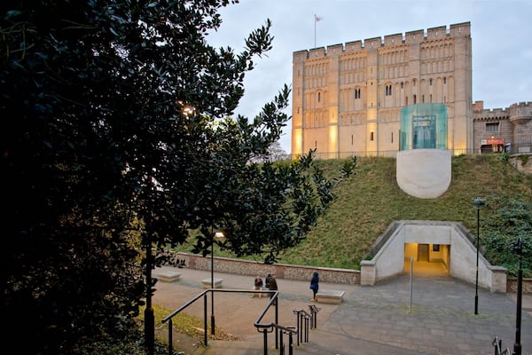 Norwich Castle showing heritage architecture and a garden