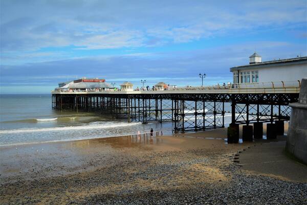 KJJDEH Cromer pier view from the beach, Norfolk seaside town.