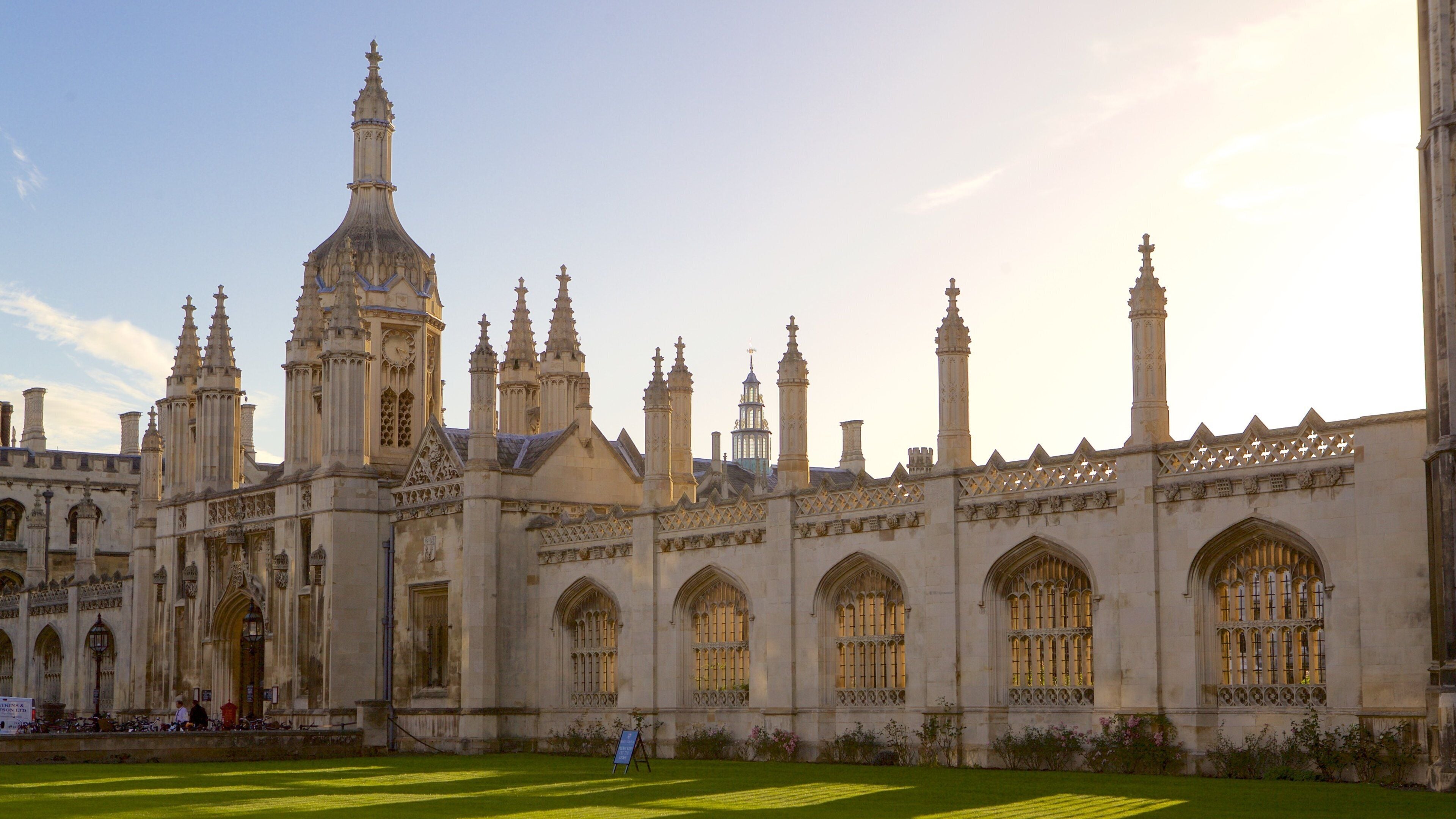 A historic building with intricate architecture, including towers and arched windows.