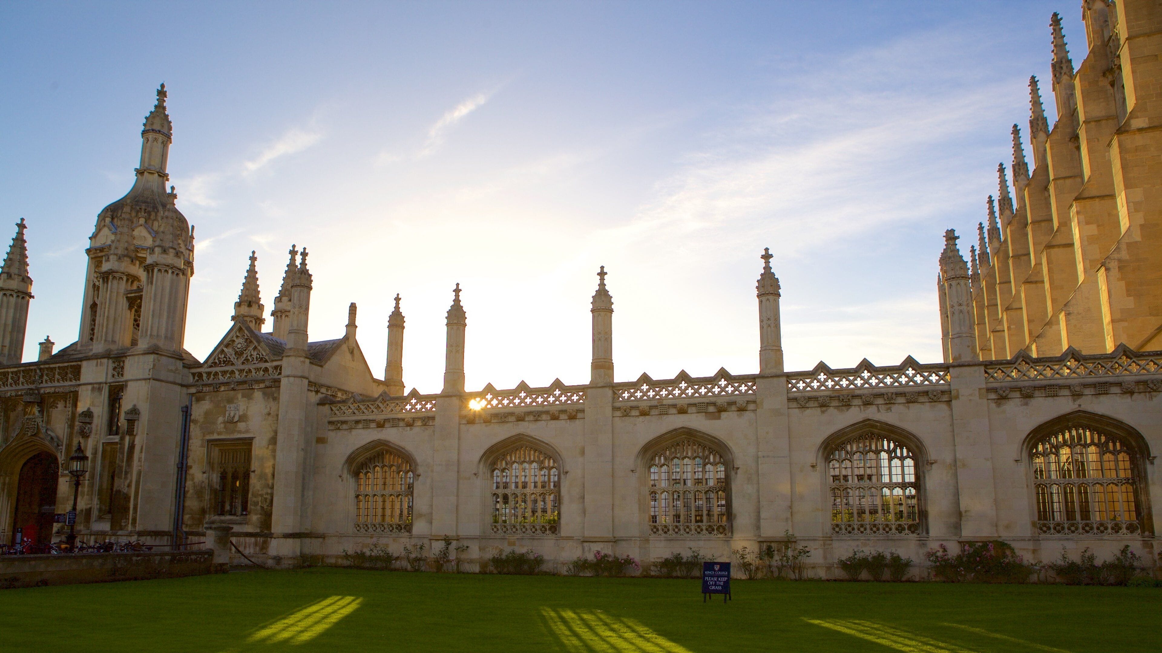 A historic building with intricate architecture, including pointed arches and spires.