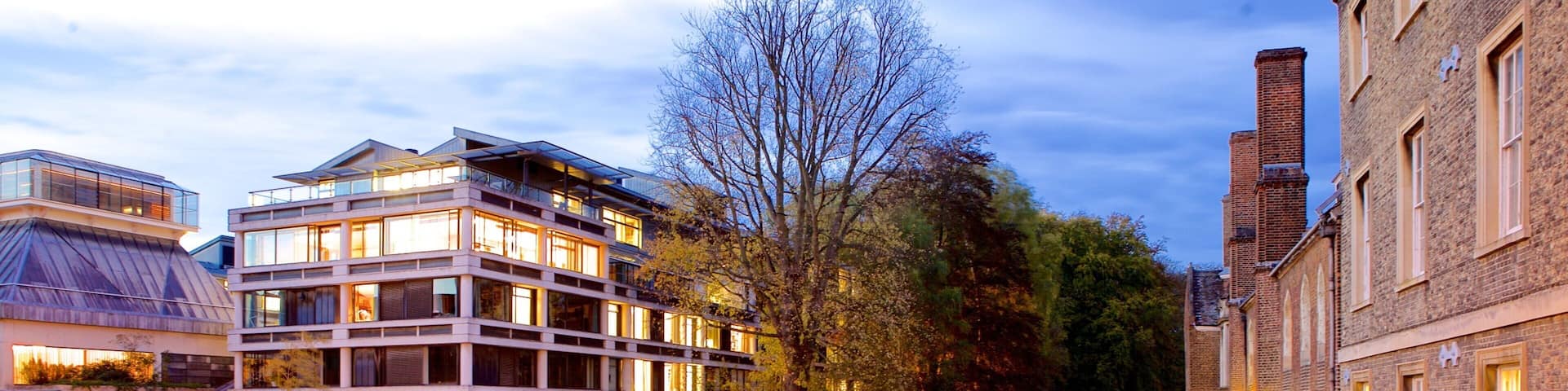 Mathematical Bridge featuring a river or creek, night scenes and a bridge