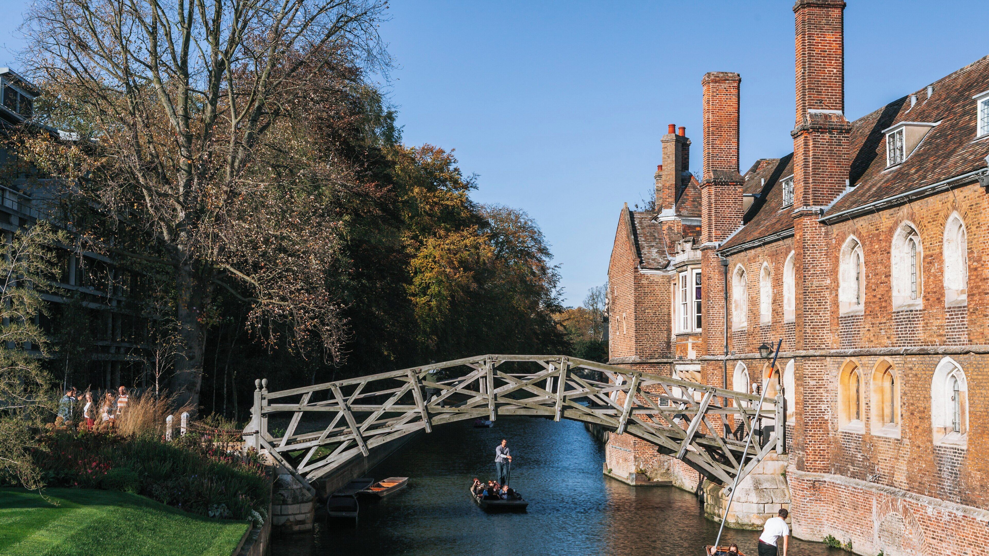 Mathematical Bridge showcases unique engineering in Cambridge City Centre during a clear autumn day