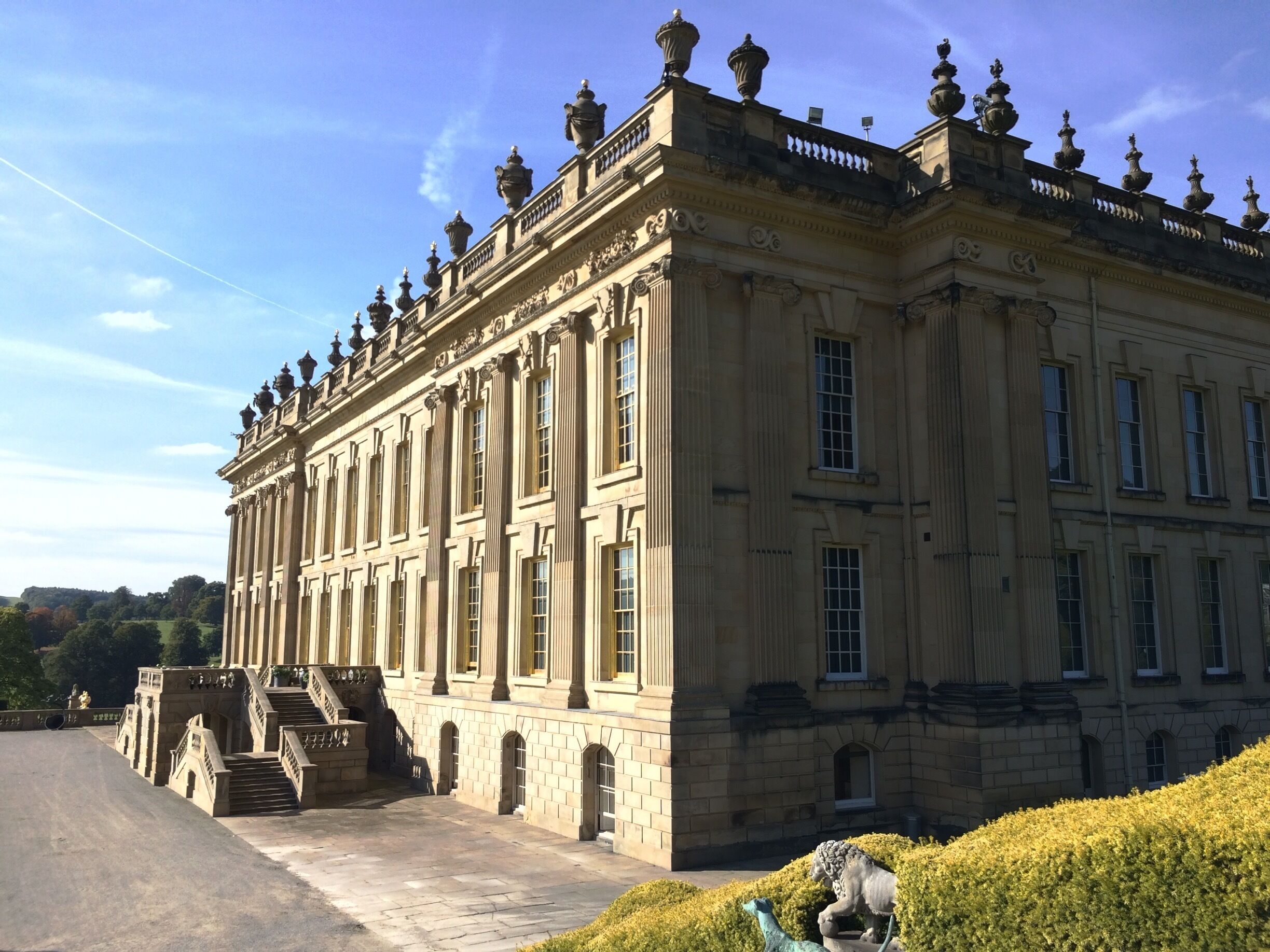 Chatsworth House is a stately home in Derbyshire, England. It is in the Derbyshire Dales, about 3.5 miles (5.6 km) north-east of Bakewell and 9 miles (14 km) west of Chesterfield. It is the seat of the Duke of Devonshire and has been home to the Cavendish family since 1549.
Standing on the east bank of the River Derwent, Chatsworth looks across to the low hills that divide the Derwent and Wye valleys. The house, set in expansive parkland and backed by wooded, rocky hills rising to heather moorland, contains a unique collection of priceless paintings, furniture, Old Master drawings, neoclassical sculptures, books and other artefacts. Chatsworth has been selected as the United Kingdom's favourite country house several times and has been used many times in films and TV...

www.chatsworth.org
