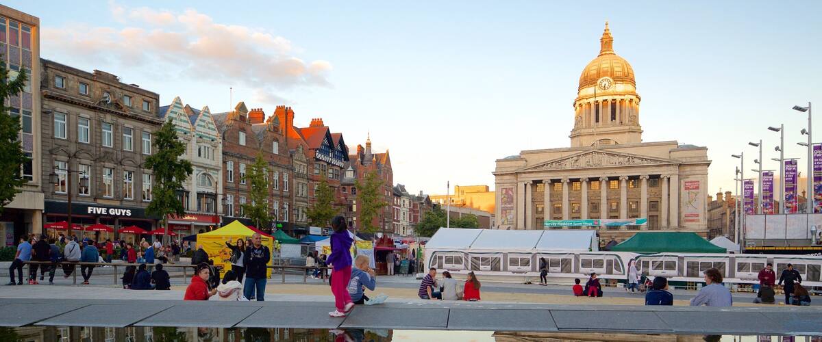 Old Market Square showing a city, markets and a river or creek