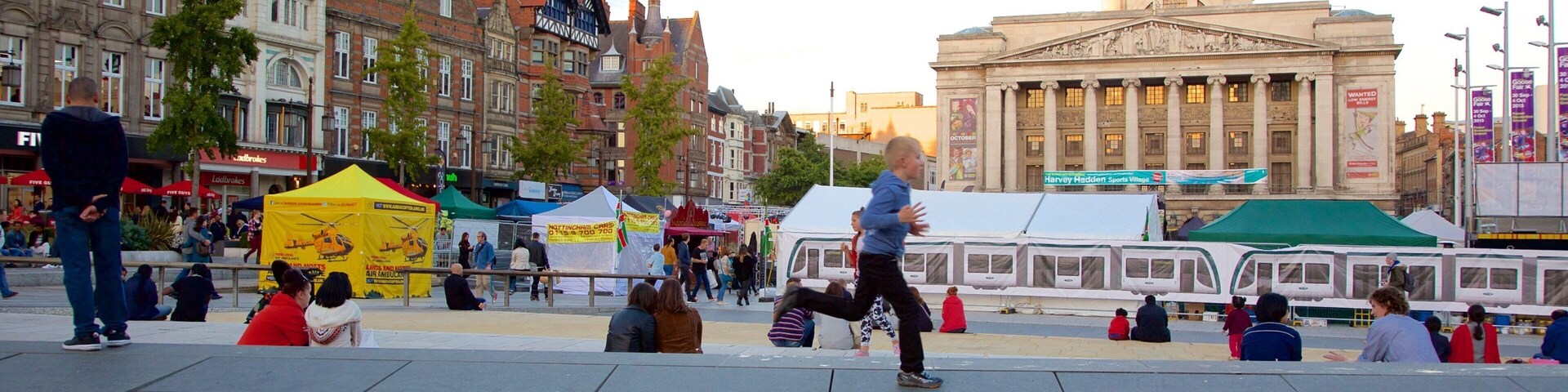 Old Market Square which includes markets, a river or creek and an administrative buidling