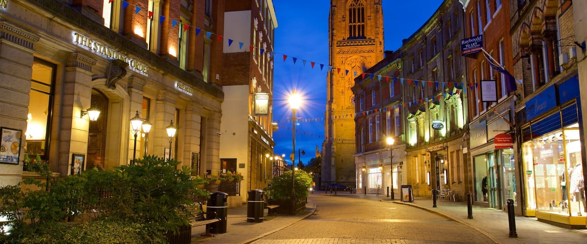 Derby Cathedral showing night scenes, heritage architecture and a city