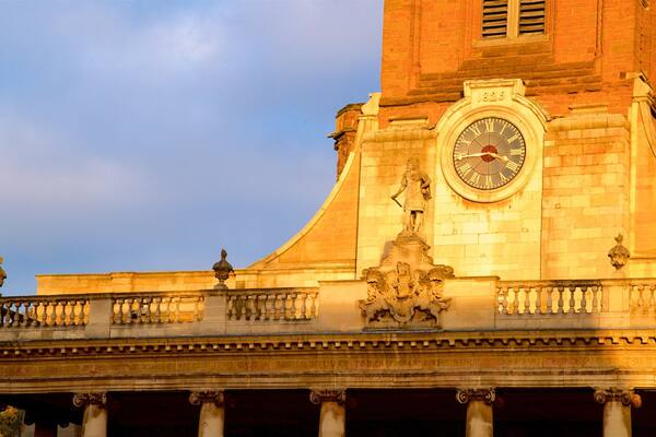All Saints Church which includes a sunset and heritage elements