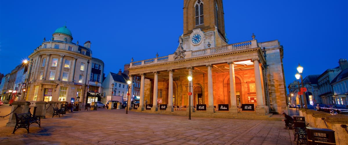 All Saints Church featuring night scenes, a square or plaza and heritage architecture