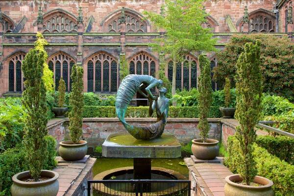 Chester Cathedral which includes a fountain, a church or cathedral and a garden