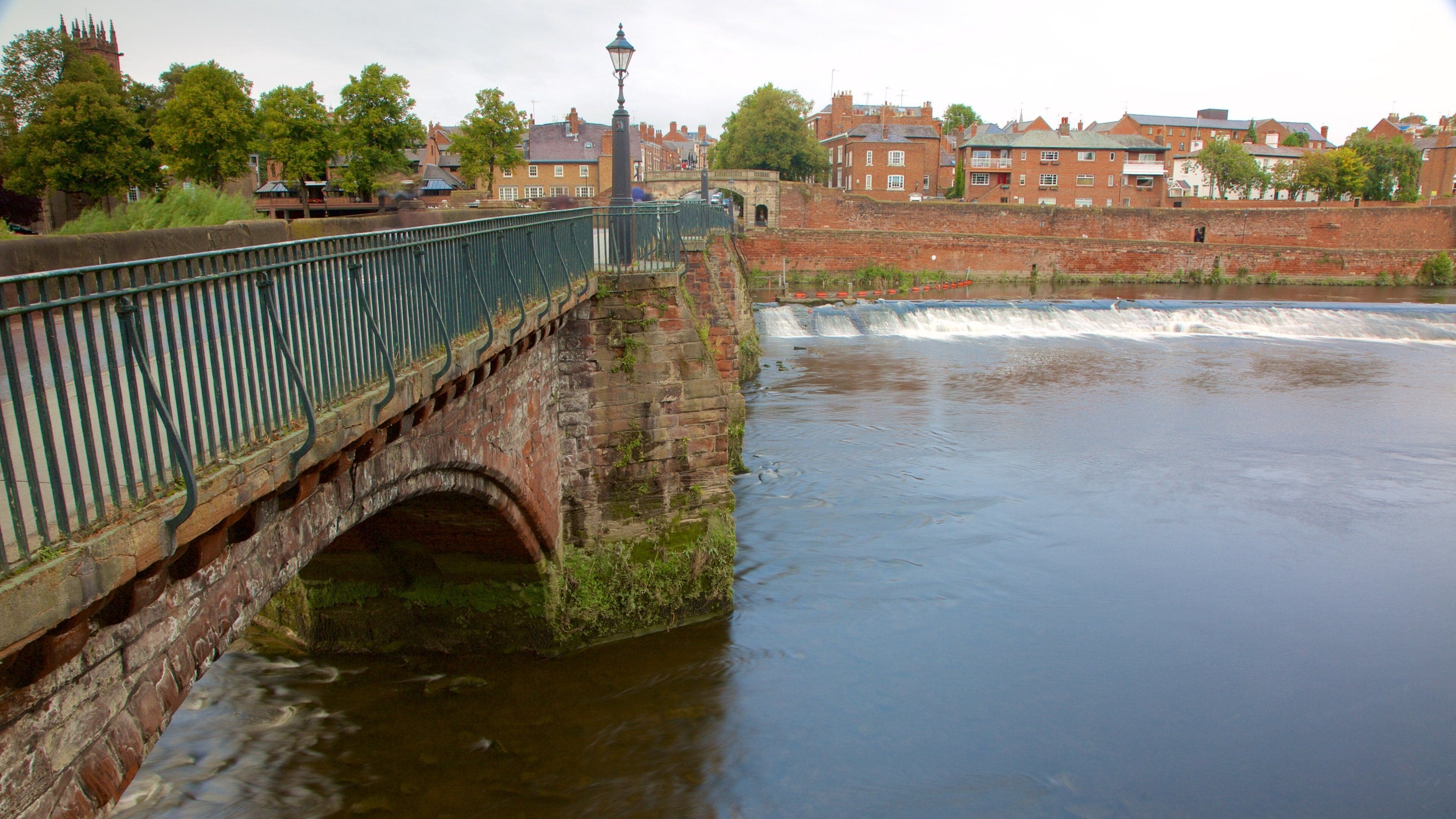Old Dee Bridge which includes heritage elements, a river or creek and a bridge