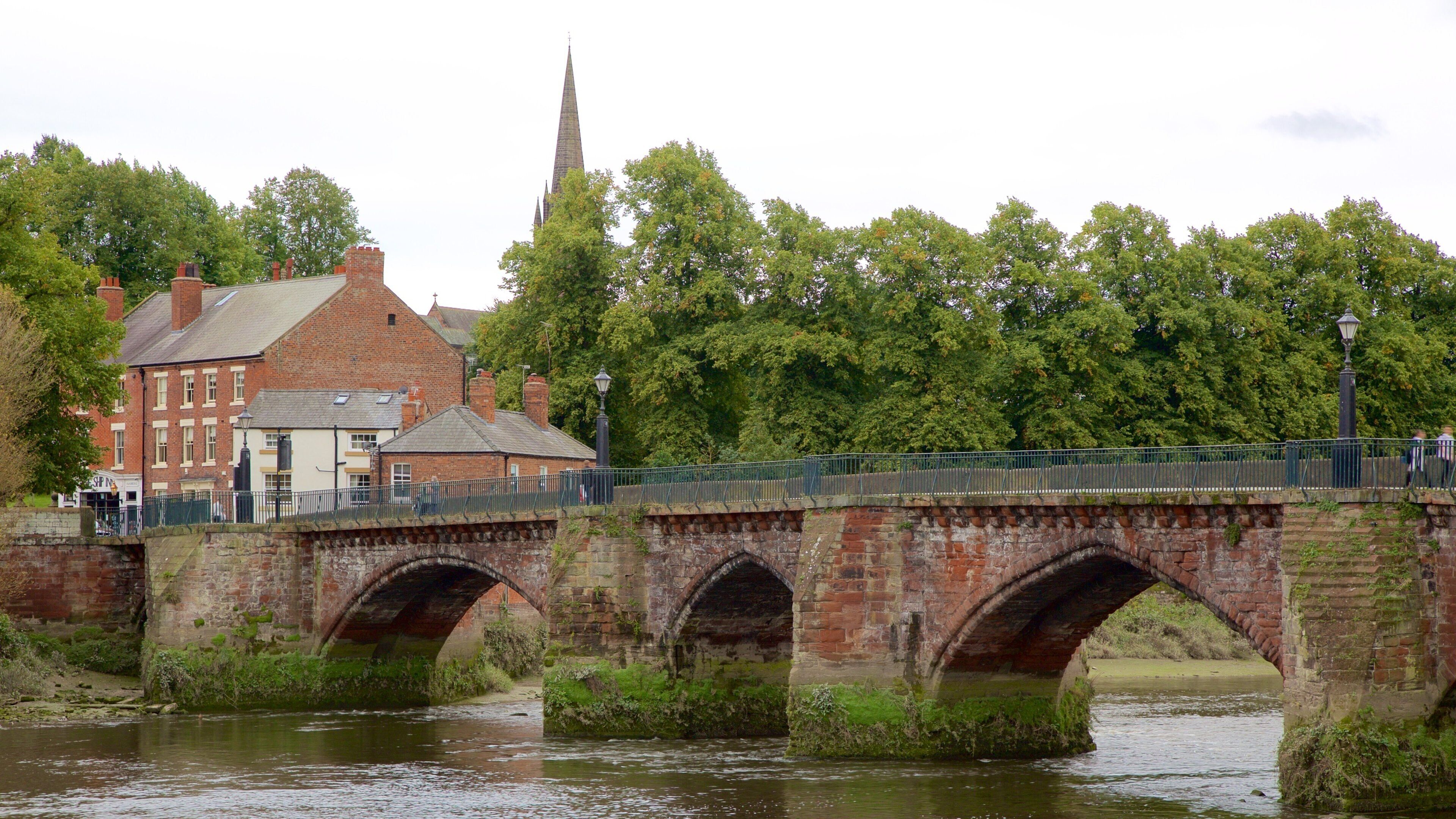 Old Dee Bridge featuring heritage elements, a bridge and a river or creek