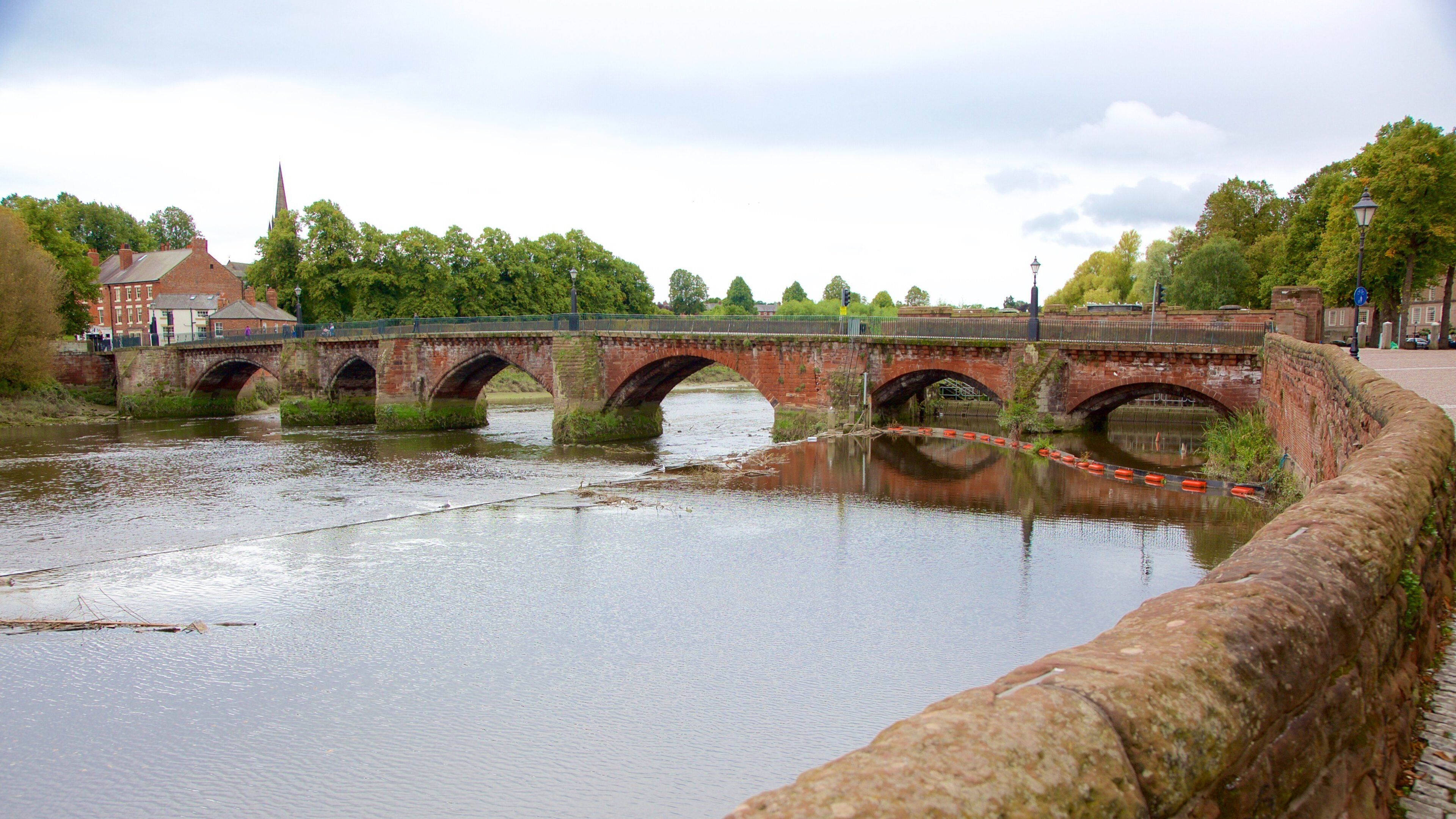 Old Dee Bridge featuring a river or creek and a bridge