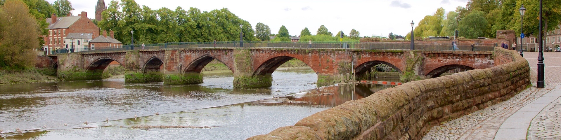 Old Dee Bridge which includes heritage elements, a river or creek and a bridge