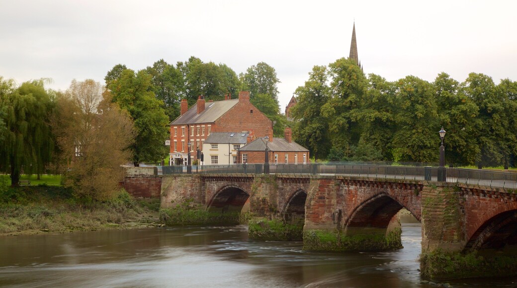 Old Dee Bridge featuring a bridge, a river or creek and heritage elements
