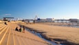 Blackpool Beach showing a beach and general coastal views as well as a small group of people
