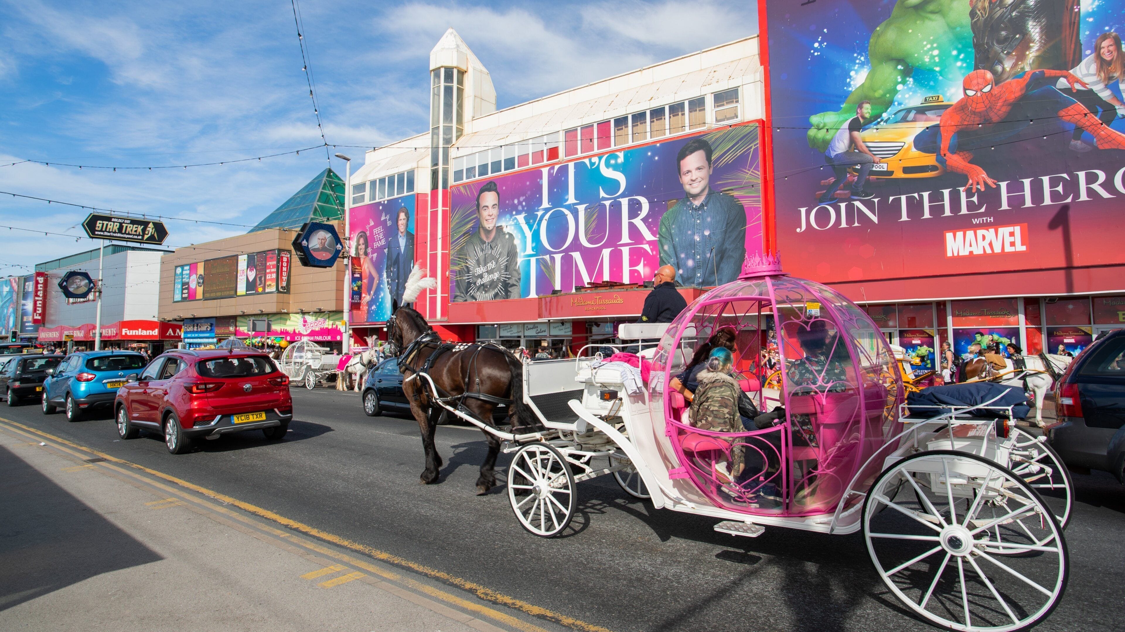 Madame Tussauds Waxworks which includes signage