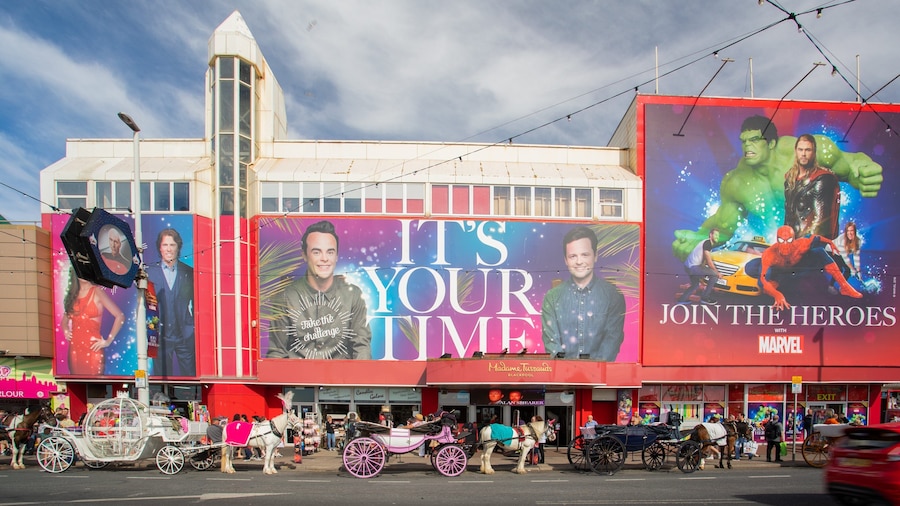 Madame Tussauds Waxworks which includes signage