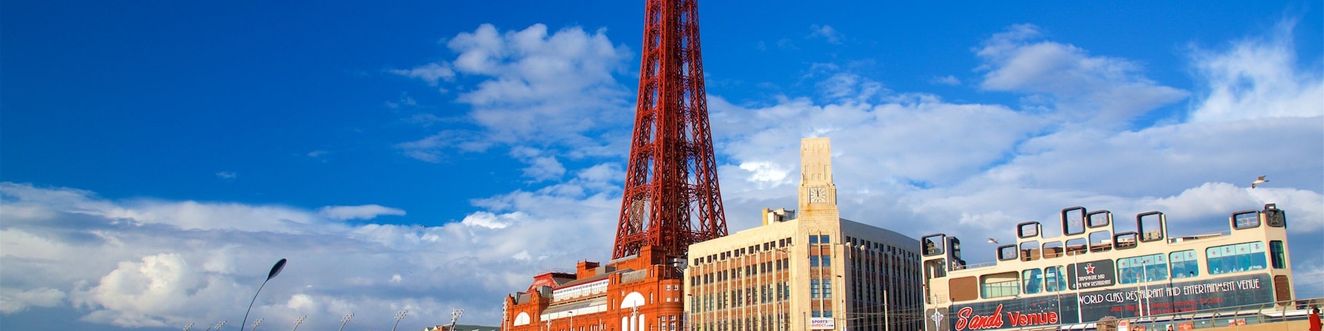 Blackpool Tower featuring a beach, a coastal town and general coastal views