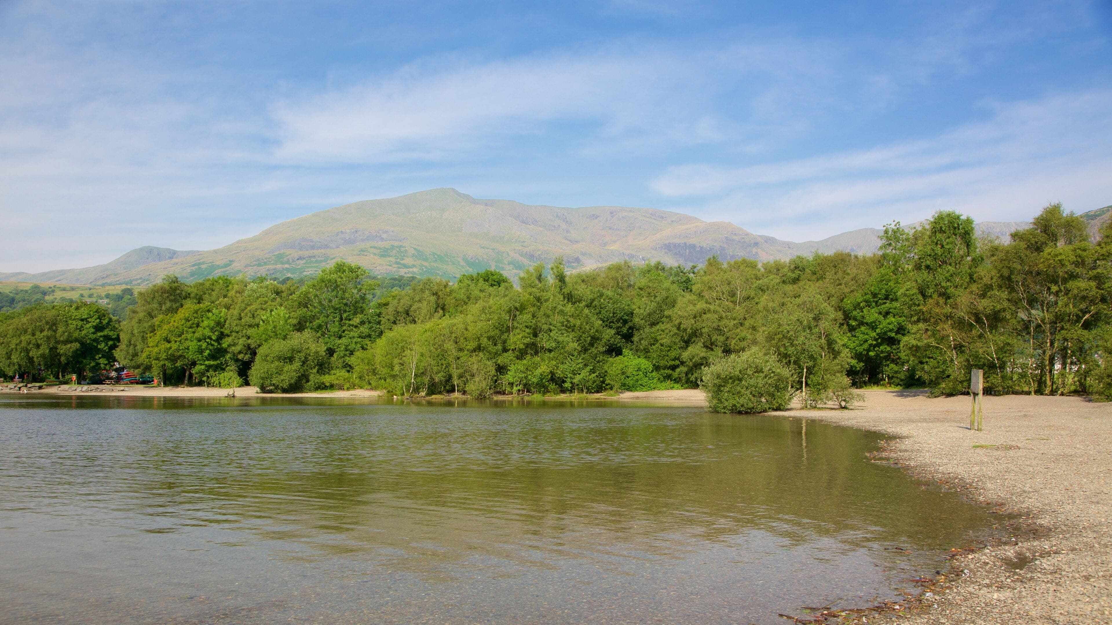 Coniston Water showing a pebble beach and a lake or waterhole