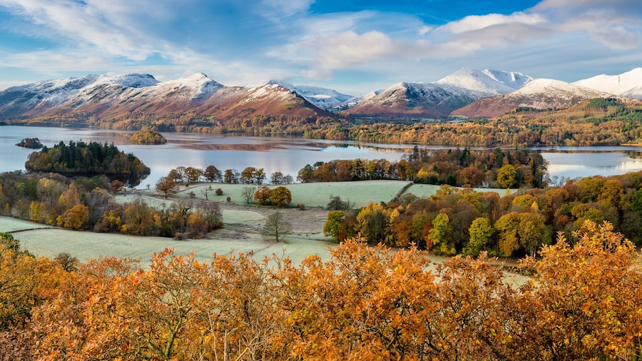 Beautiful view of Derwentwater in the English Lake District on a frosty Autumn morning with snow on the fells.