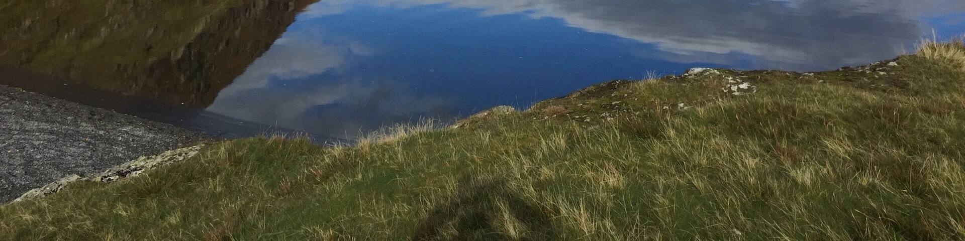 Crummock water to left is the bottom edge of Melbreak .. You can walk round the lake . Great pub in loweswater close by The Kirkstile Inn ( real ale ..good food )