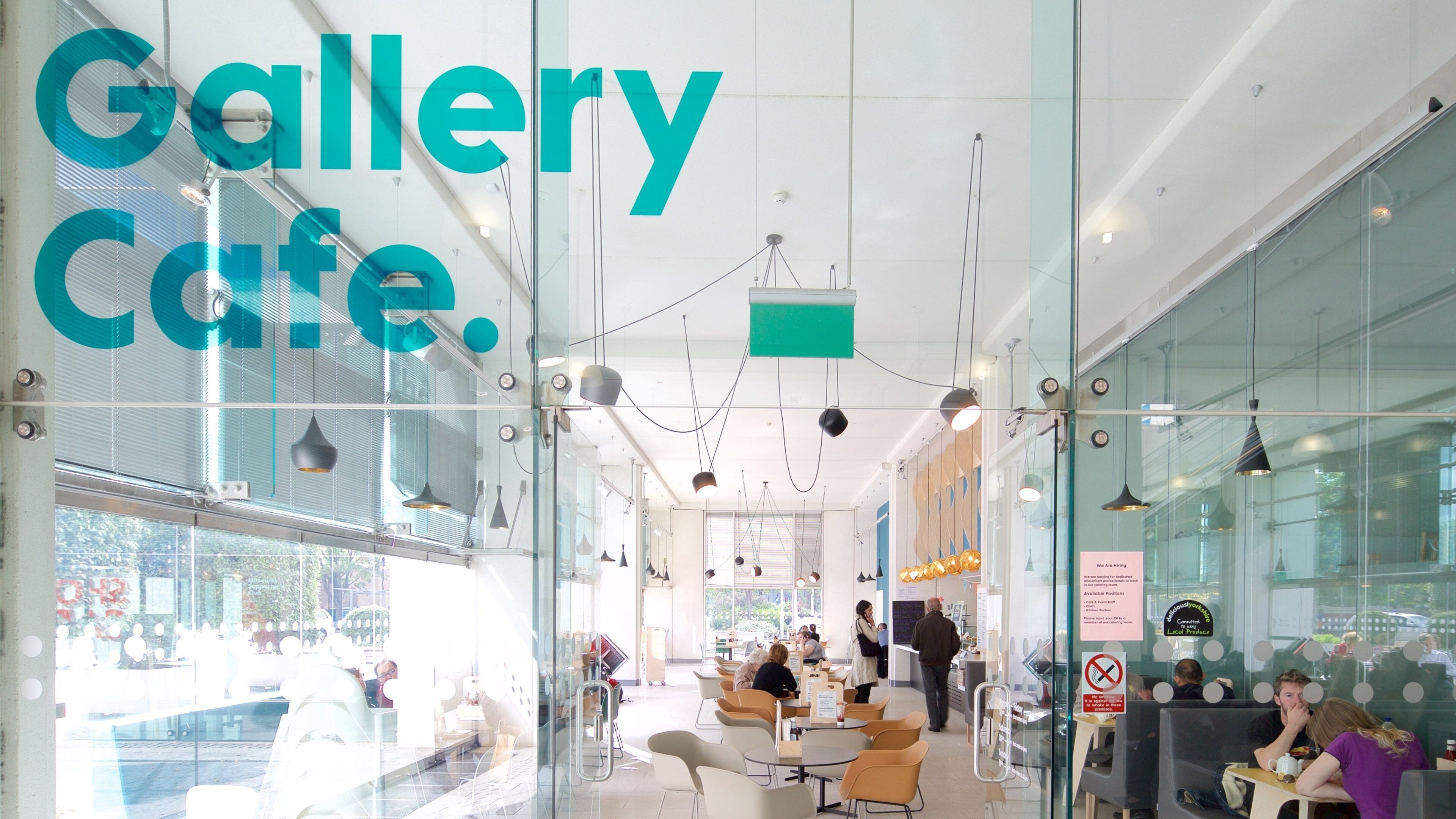 Millennium Gallery which includes cafe lifestyle, signage and interior views