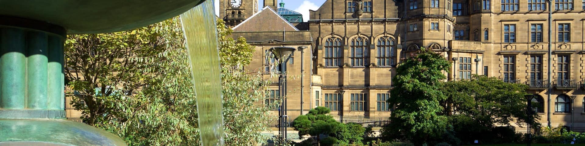 Peace Gardens which includes a castle, a garden and a fountain