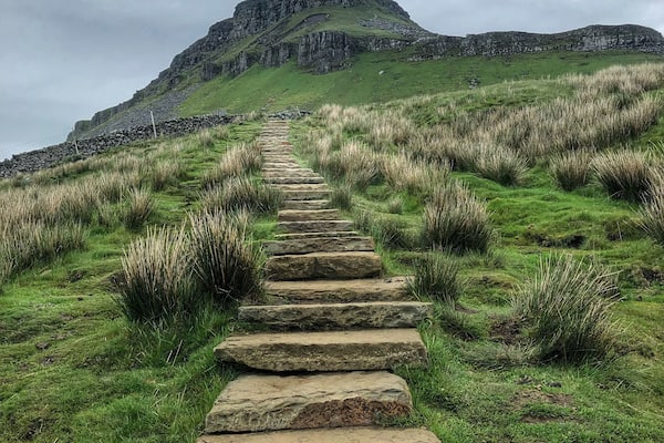 Pen-y-Ghent makes up one the Yorkshire 3 peaks which, if you accept the challenge have to complete all 3 peaks and 24 miles within 12 hours. Most people start with this one (the smallest of the 3 ) from the nearby village of Horton-in-Ribblesdale. I’ve completed the challenge many years ago in my youth and this time we just tackled this one on a circular 6 mile walk.
We took the 3 peaks ascent route which is steep in places and involves a scramble up some rocks near the end but the views (when clear) are stunning. There are lots of walks of varying lengths around the Yorkshire Dales, a definite walkers paradise. Just make sure you are prepared for all weathers, by the time we descended you couldn’t see the summit for cloud.