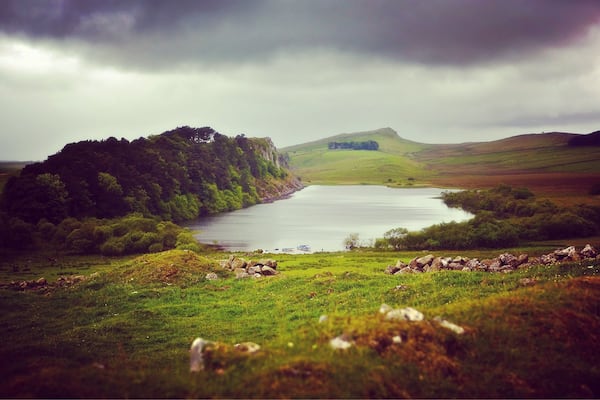 Hadrian’s Wall. Pointing towards Crag Lough and Steel Rigg car park. Hadrian’s Wall runs over the left hand cliff and down to Sycamore Gap.