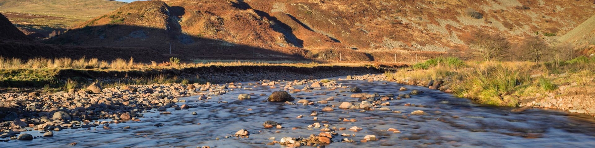 Northumberland National Park which includes tranquil scenes and a river or creek