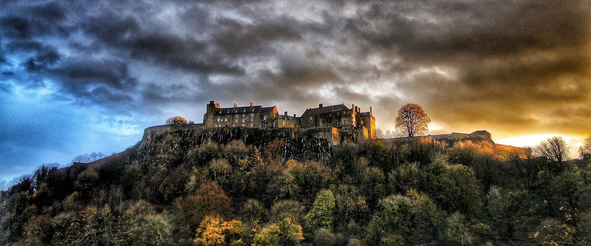 Sunrise over Stitling Castle which has the largest great hall in Scotland. The ancient graveyards around it hold some stunning statues.