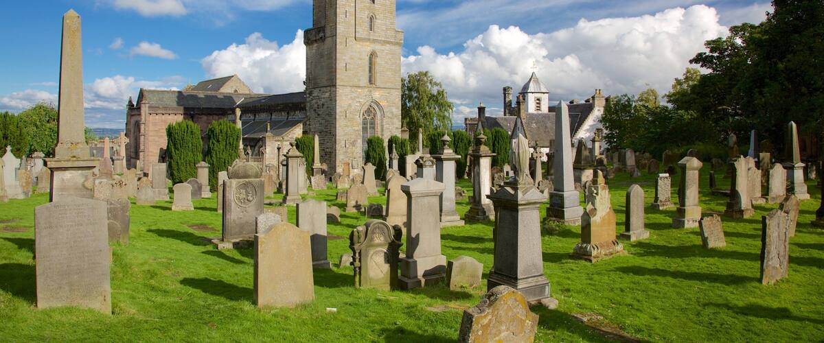 Church of the Holy Rude showing a church or cathedral and a cemetery