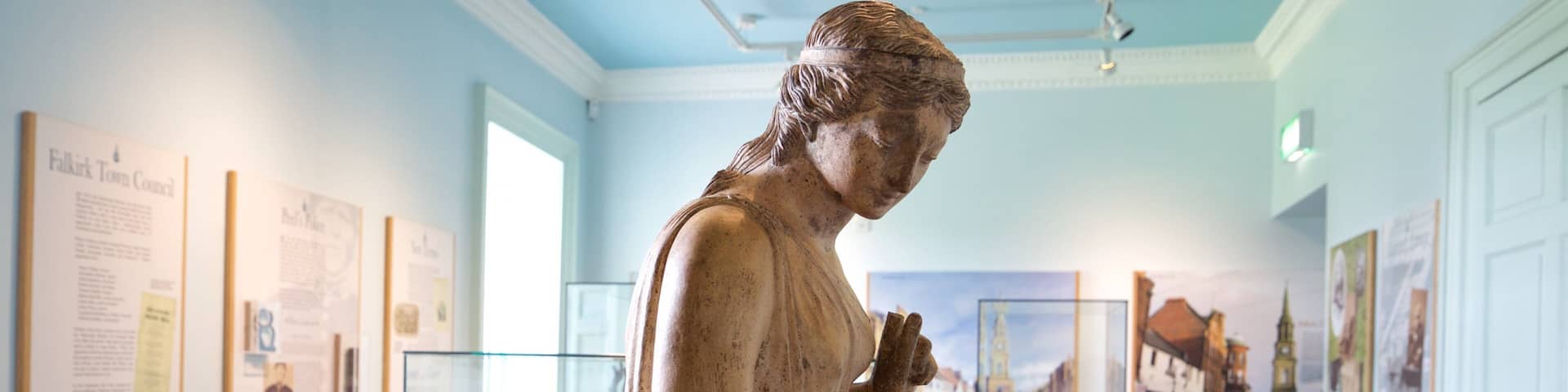 Callendar House which includes a statue or sculpture and interior views