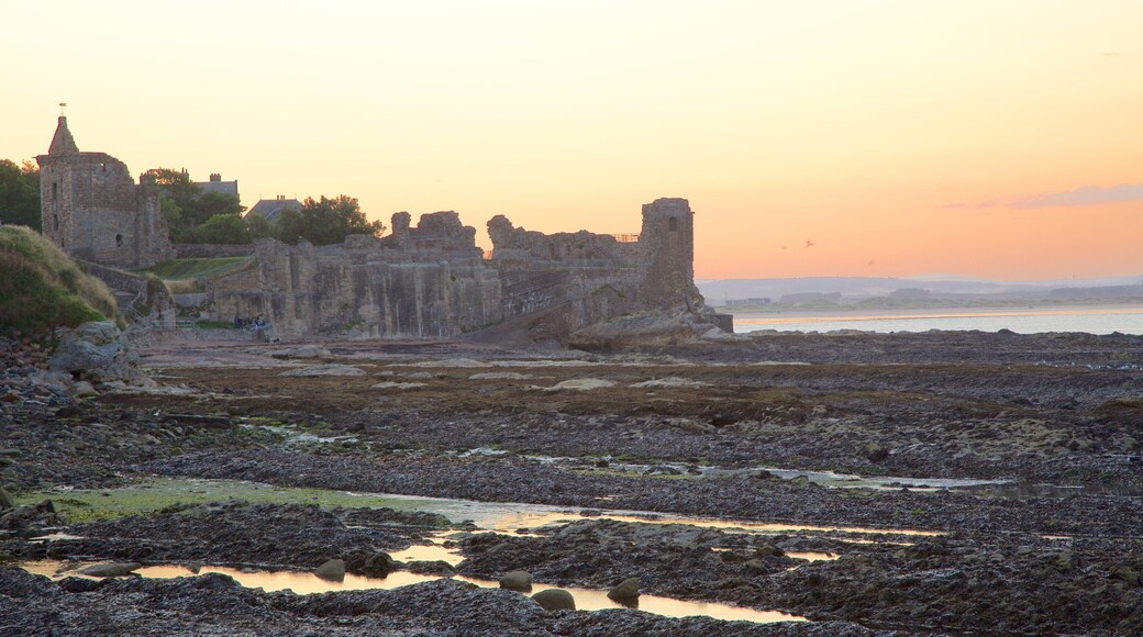 St. Andrew\'s Castle showing rocky coastline, a sunset and general coastal views