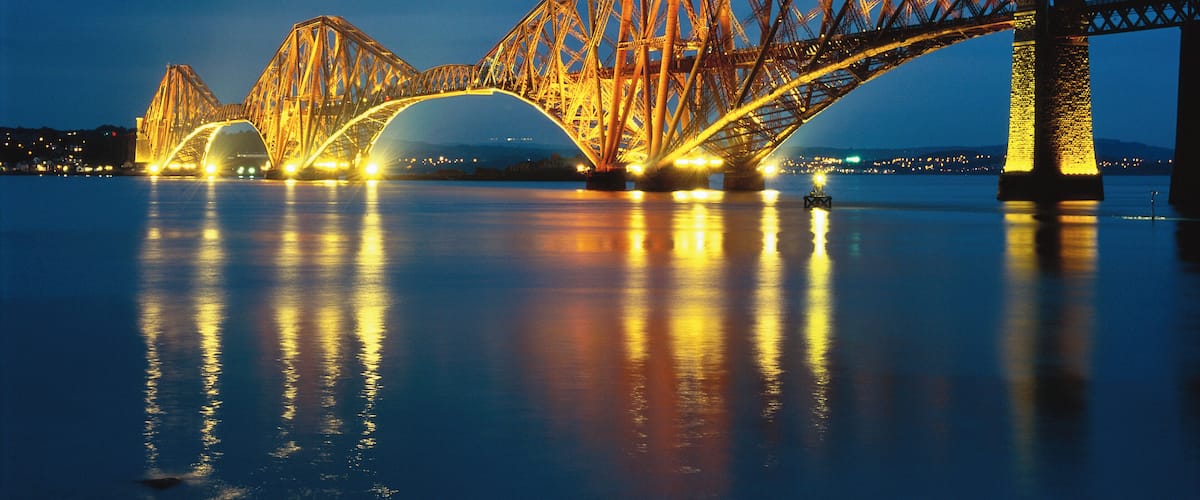 Forth Rail Bridge illuminating Queensferry, Edinburgh, Scotland