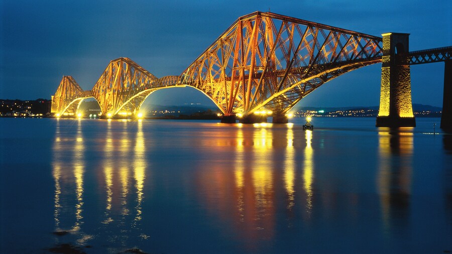 Forth Rail Bridge illuminating Queensferry, Edinburgh, Scotland