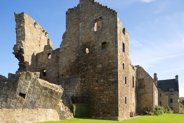 Aberdour Castle featuring chateau or palace, building ruins and heritage elements