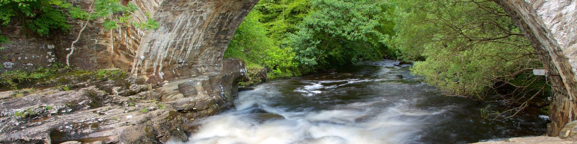 Falls of Dochart which includes a river or creek and a bridge
