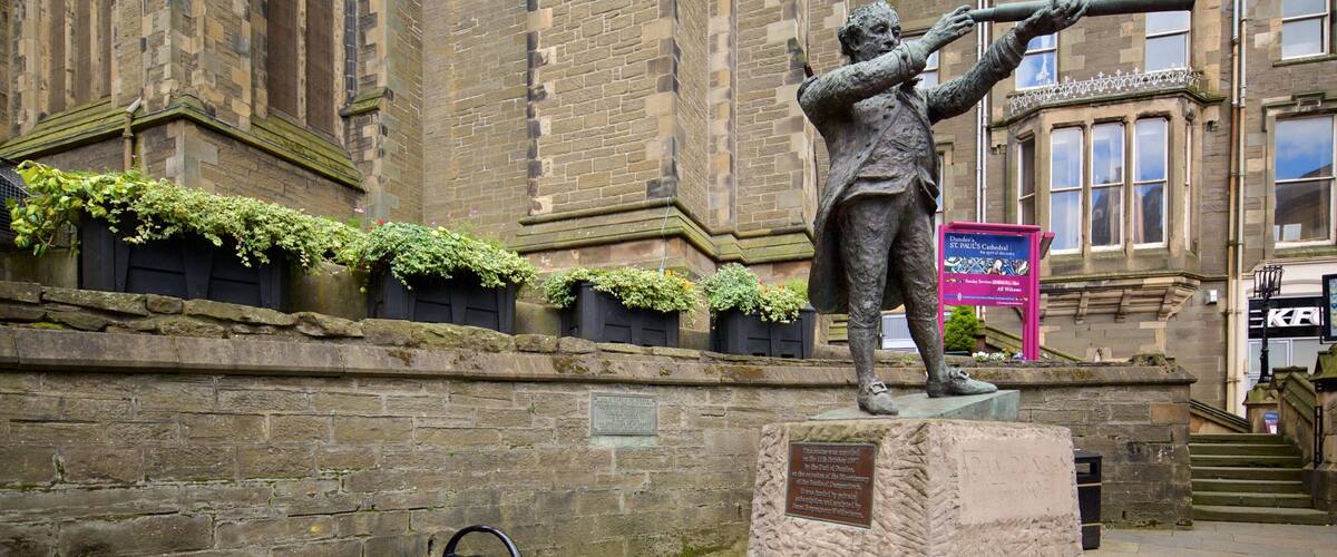 St. Paul\'s Episcopal Cathedral featuring outdoor art, a church or cathedral and street scenes