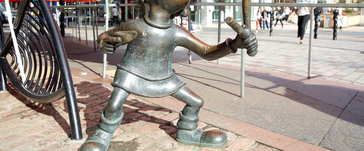 Minnie the Minx Statue featuring outdoor art
