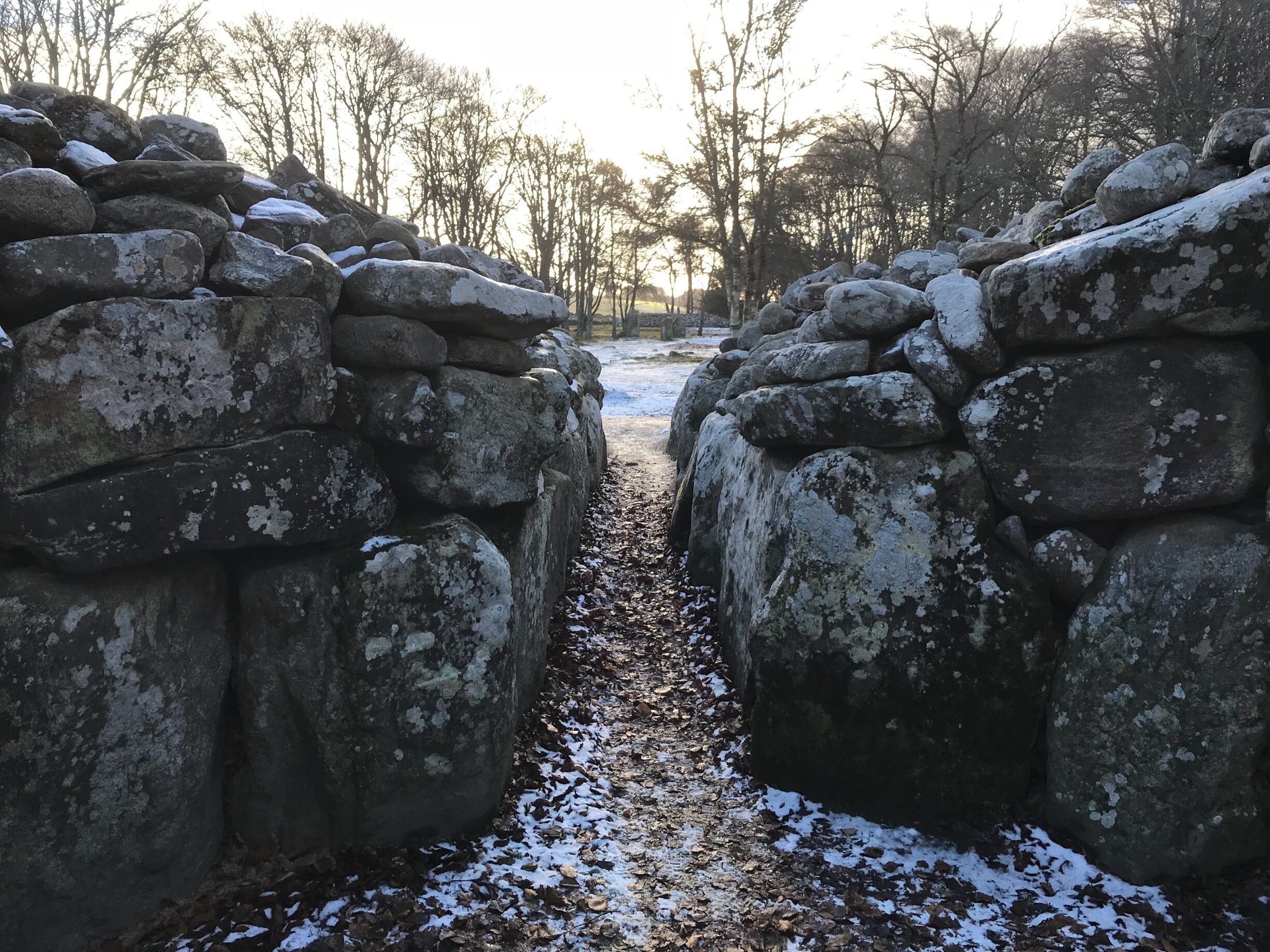 Inside the North East Cairn looking out towards the sun.