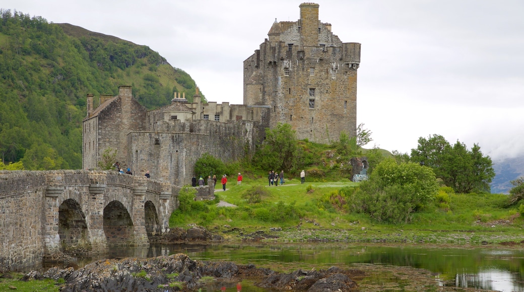 Eilean Donan Castle featuring a river or creek, a castle and heritage elements