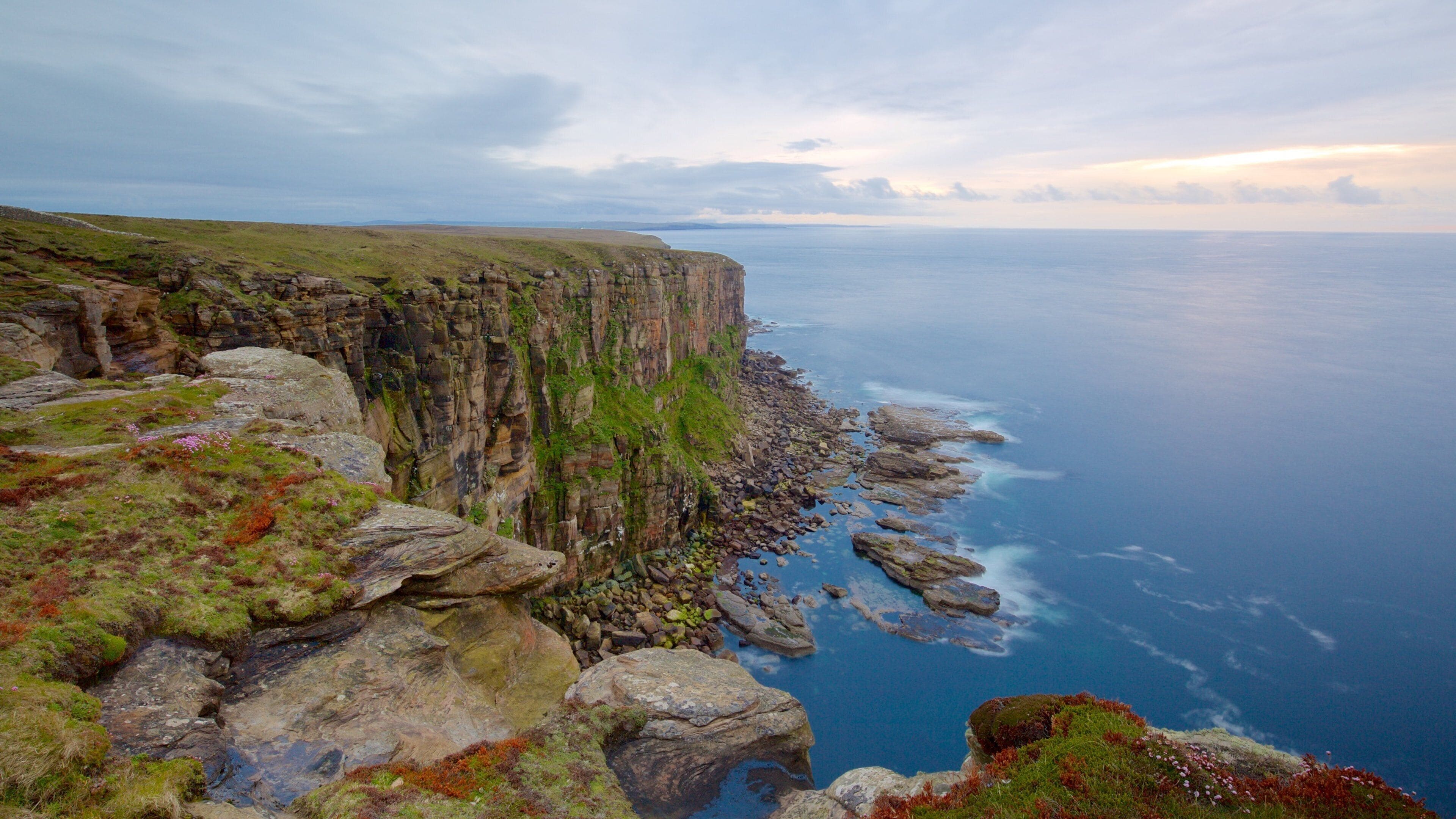 Dunnet Head Lighthouse which includes rugged coastline