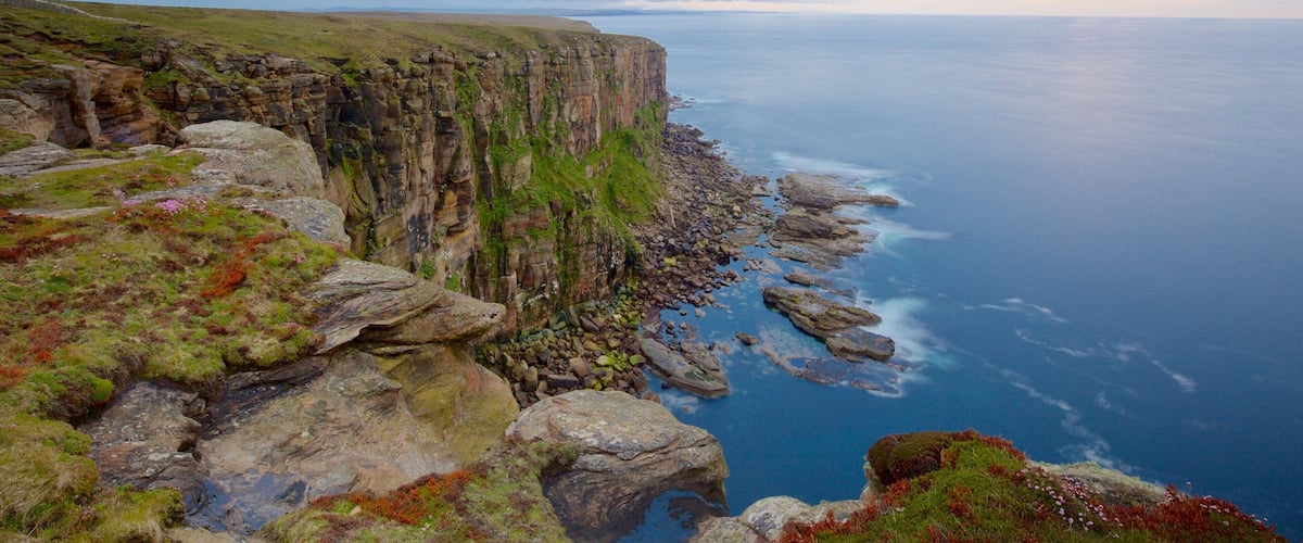 Dunnet Head Lighthouse which includes rugged coastline