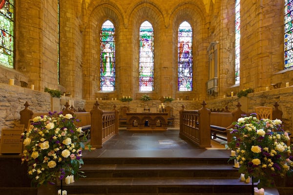 Dornoch Cathedral which includes heritage elements, a church or cathedral and interior views